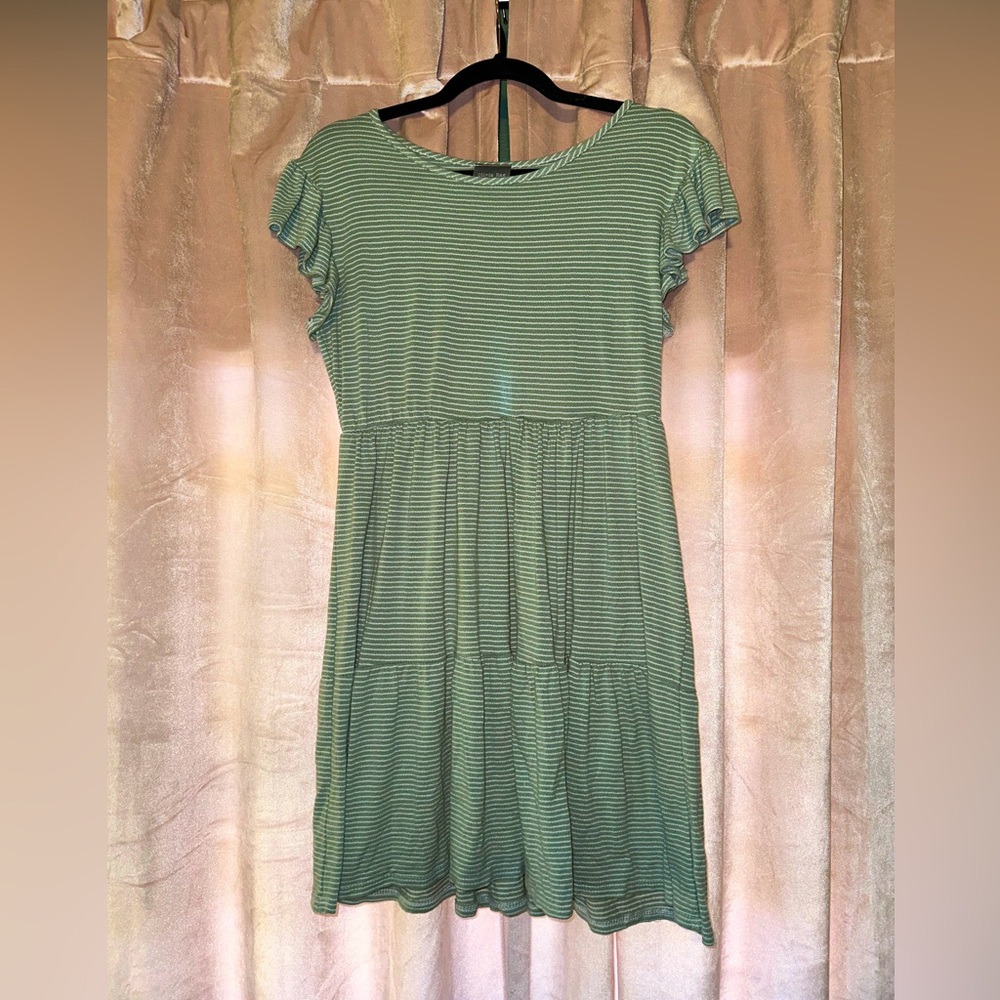Olivia Rae babydoll length sage green striped dress with ruffled shoulder detail
